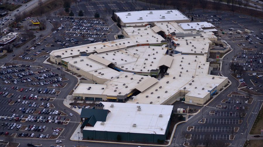 Low slope, single-ply commercial roof installation on the Asheville Outlets in North Carolina